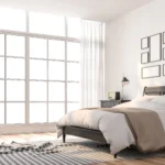 Interior view of a modern 1 bedroom apartment with open-concept living space and natural lighting.